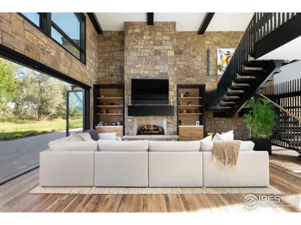 a kitchen with stainless steel appliances kitchen island a chandelier