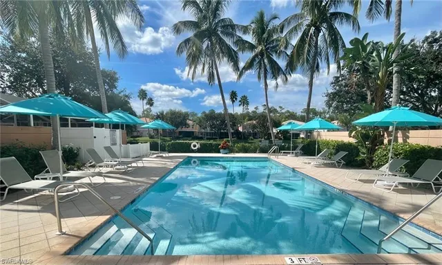 a view of a backyard with a patio
