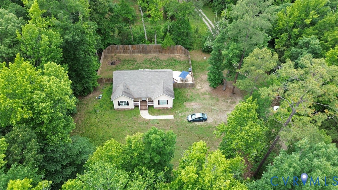 2406 Emanuel Church Road Powhatan, VA 23139 - Photo 46 of 48 Single-story residence surrounded by lush green fo