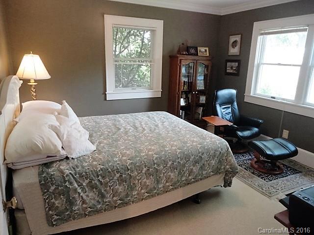 229 Callahan Street Rutherfordton, NC 28139 - Photo 14 of 24 a bedroom with a bed and a window