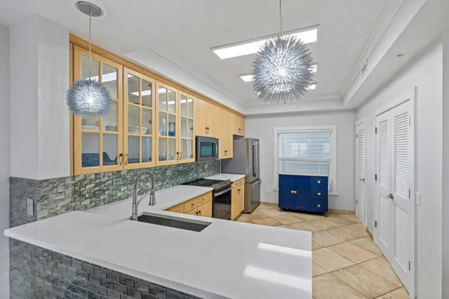 a view of a living room and dining room