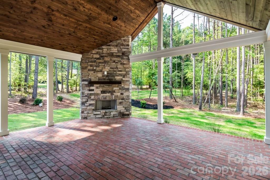 116 Silver Falls Road Troutman, NC 28166 - Photo 44 of 46 a view of empty room with wooden floor and fence