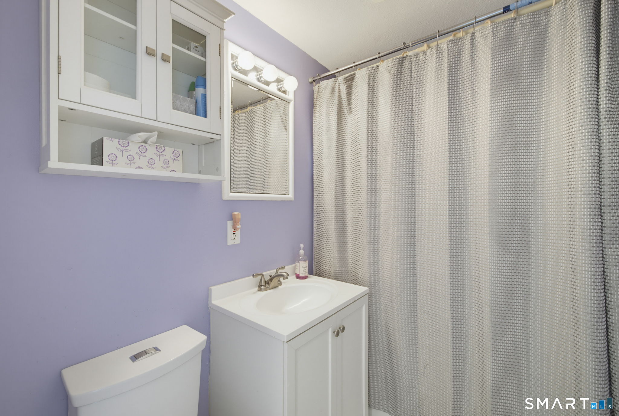 417 Hartford Road Manchester, CT 06040 - Photo 17 of 38 The updated full bathroom, on the main level, is across the hall from bedroom 1 and next to bedroom 2.