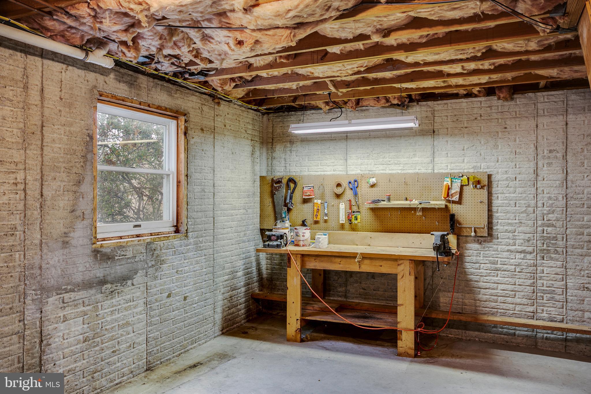 2930 Pinewick Road Ellicott City, MD 21042 - Photo 14 of 22 Workbench in basement.