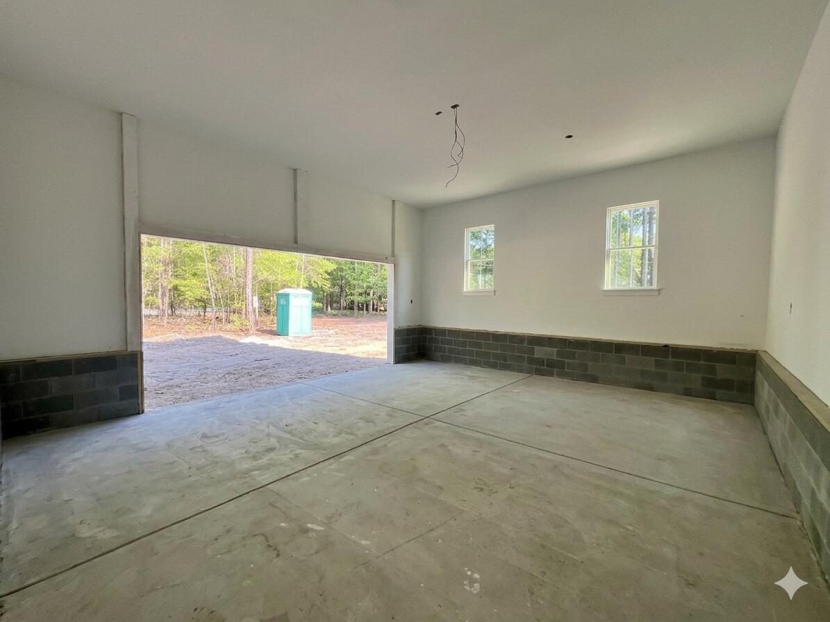 4406 Sandy Hill Farm Road Hollywood, SC 29449 - Photo 8 of 11 Spacious 2 Car Garage