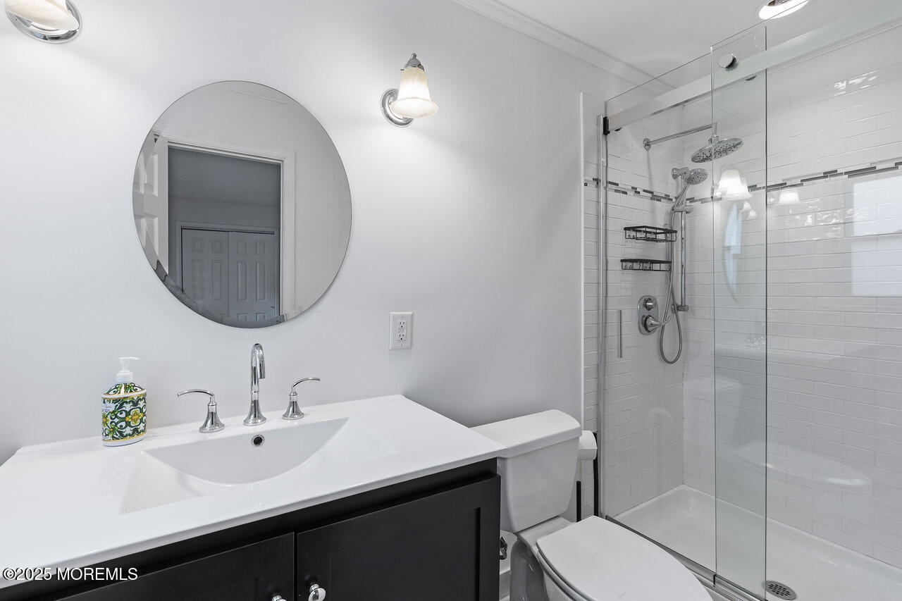 349 River Road Fair Haven, NJ 07704 - Photo 29 of 49 a bathroom with a sink toilet and shower
