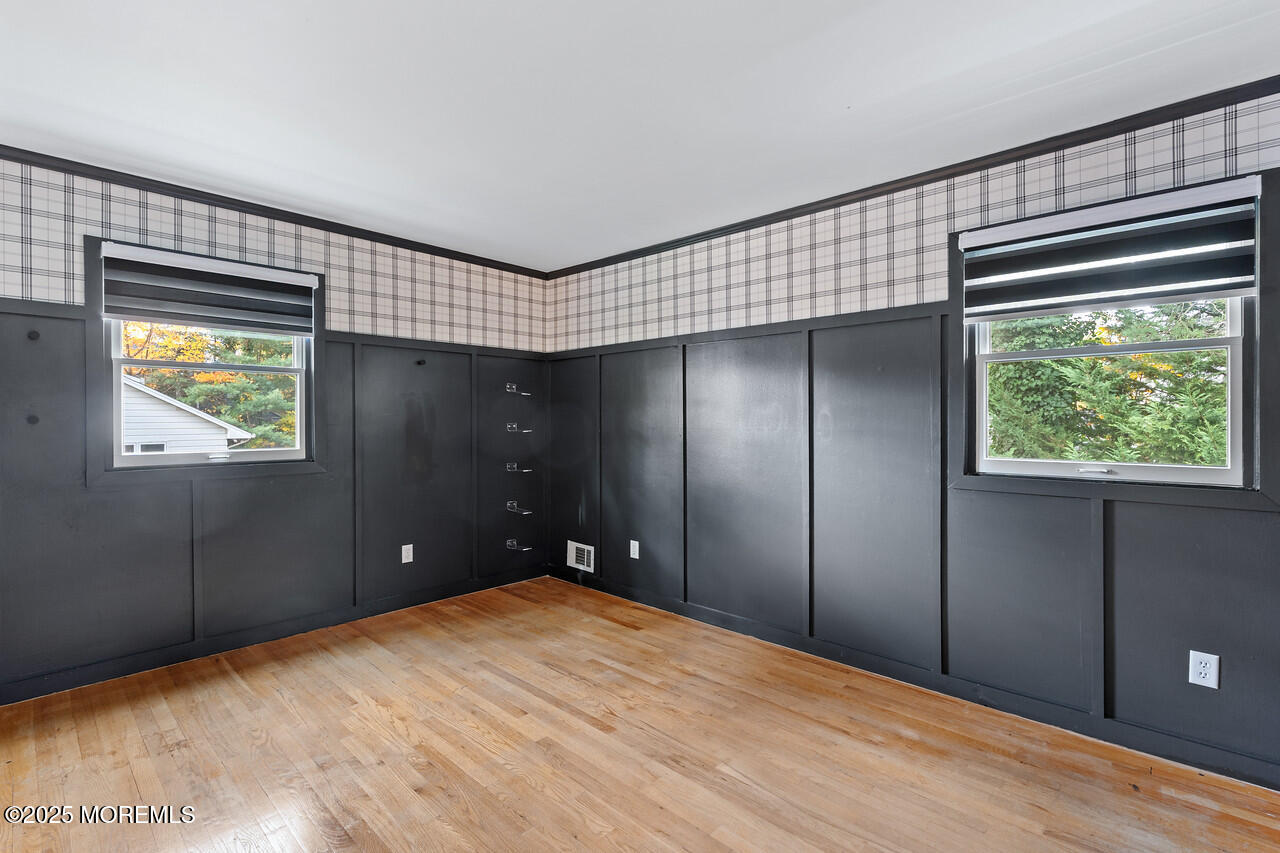 349 River Road Fair Haven, NJ 07704 - Photo 31 of 49 a view of an empty room with a window