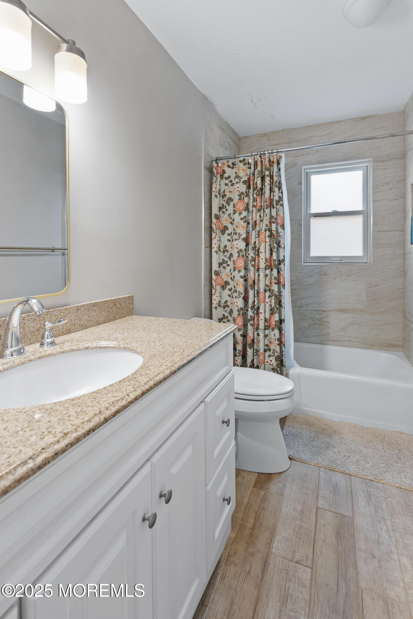 349 River Road Fair Haven, NJ 07704 - Photo 37 of 49 a bathroom with a granite countertop sink a toilet and bathtub