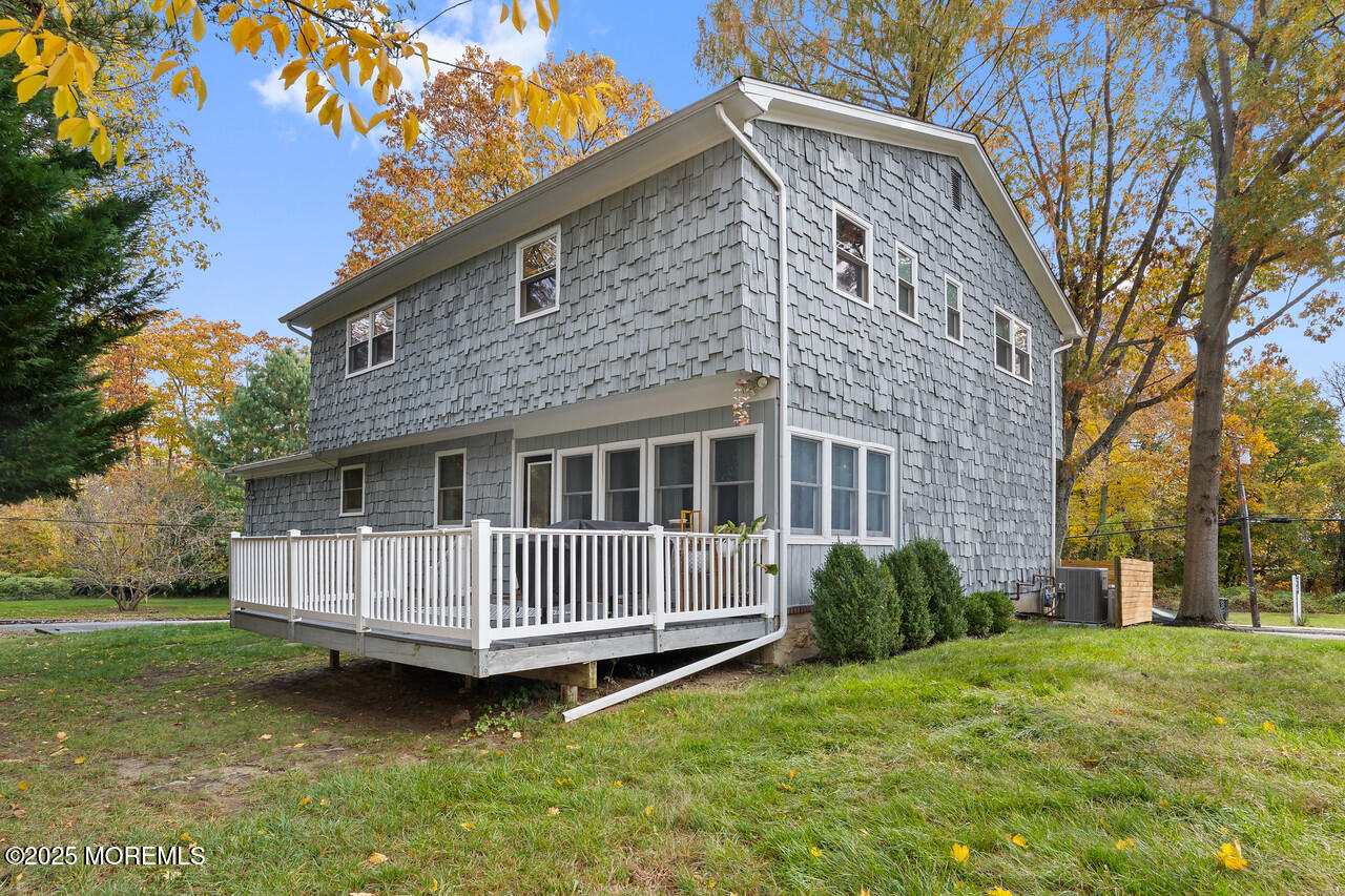 349 River Road Fair Haven, NJ 07704 - Photo 42 of 49 a view of a house with a yard and deck