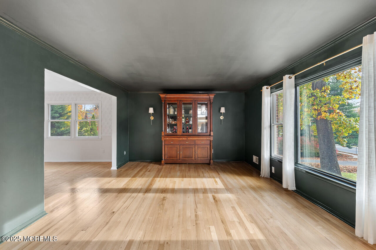 349 River Road Fair Haven, NJ 07704 - Photo 5 of 49 a view of an empty room with large windows