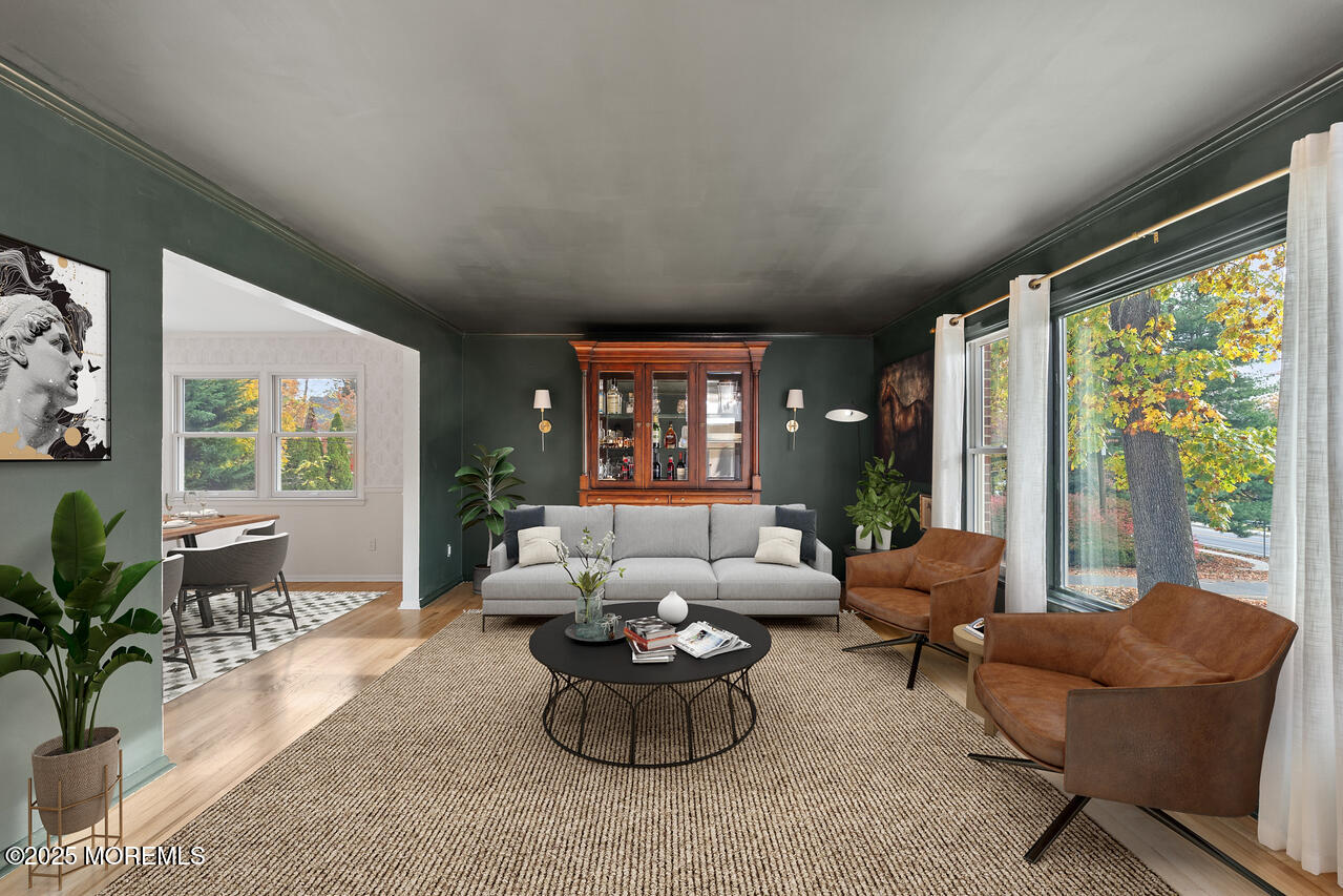 349 River Road Fair Haven, NJ 07704 - Photo 6 of 49 a living room with furniture and a large window