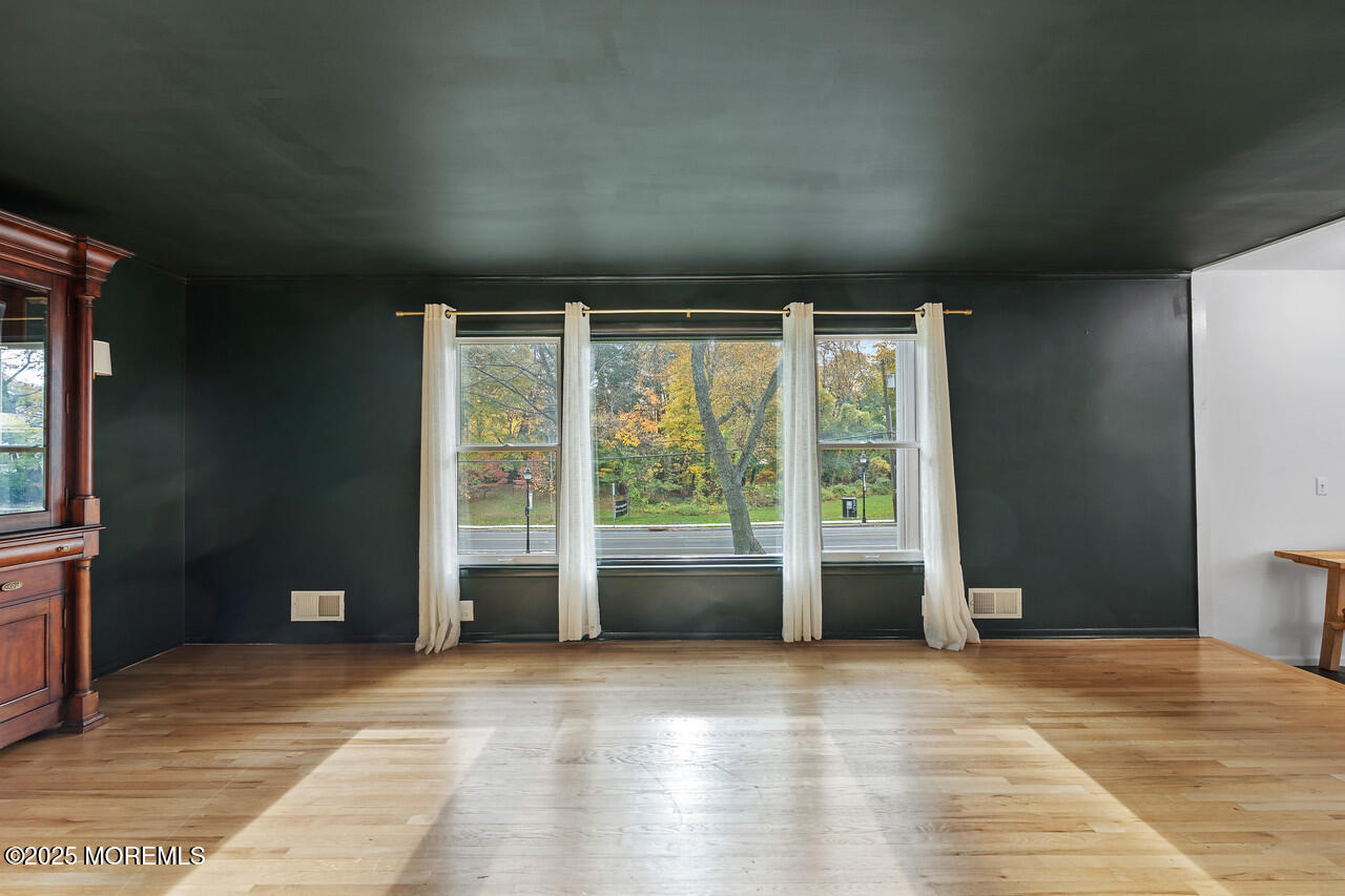349 River Road Fair Haven, NJ 07704 - Photo 7 of 49 a view of an empty room with a window