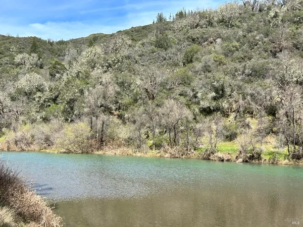 a view of a field with an outdoor space