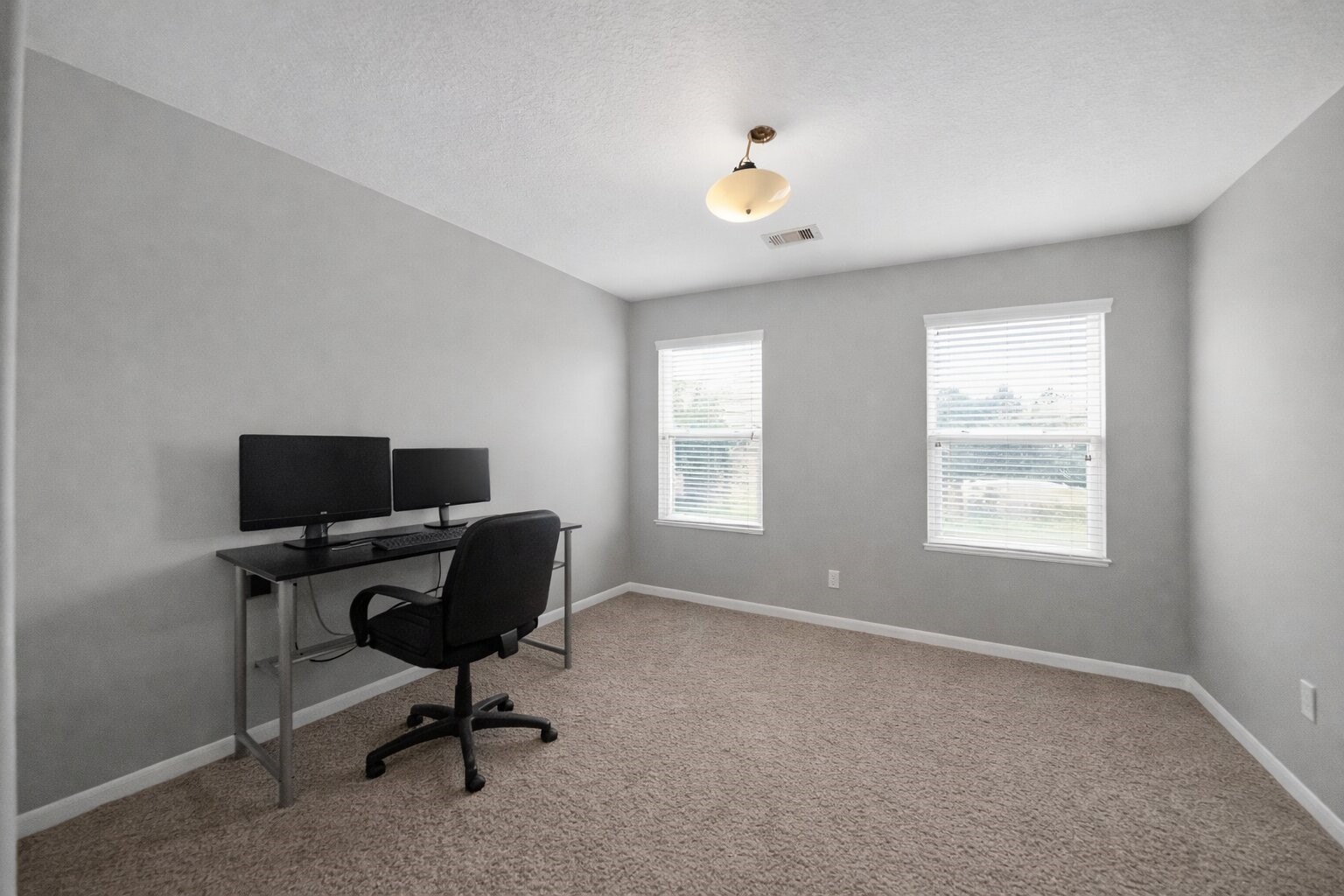 7902 Sesame Street Baytown, TX 77521 - Photo 23 of 24 a view of a workspace with a window