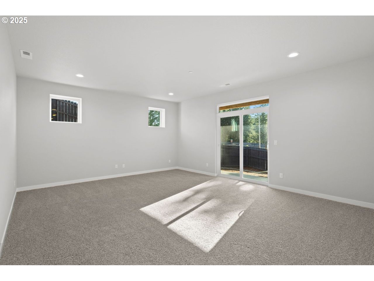 1380 North Kalani Loop Ridgefield, WA 98642 - Photo 42 of 43 a view of an empty room with wooden floor and a window