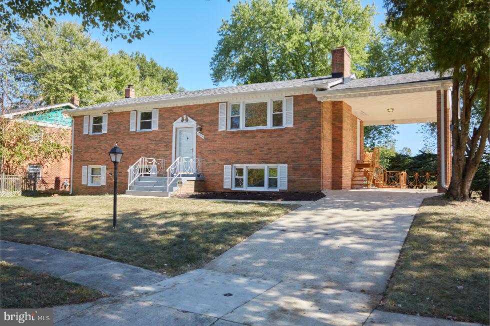 11504 Keystone Avenue Clinton, MD 20735 - Photo 1 of 33 Front view with long driveway leading to carport