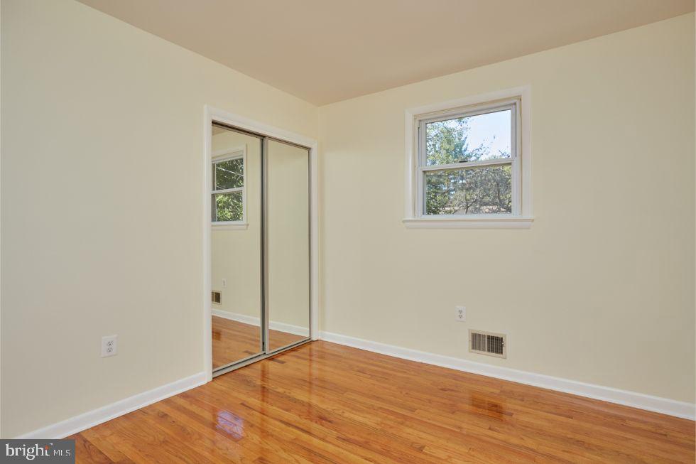 11504 Keystone Avenue Clinton, MD 20735 - Photo 19 of 33 Second bedroom with mirrored closet doors