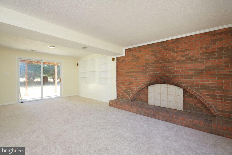 11504 Keystone Avenue Clinton, MD 20735 - Photo 24 of 33 LL recreation room with SGD to backyard