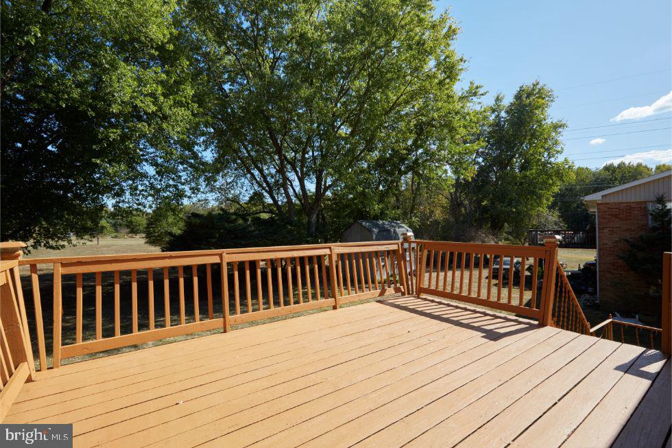 11504 Keystone Avenue Clinton, MD 20735 - Photo 8 of 33 Deck with stairs to Carport