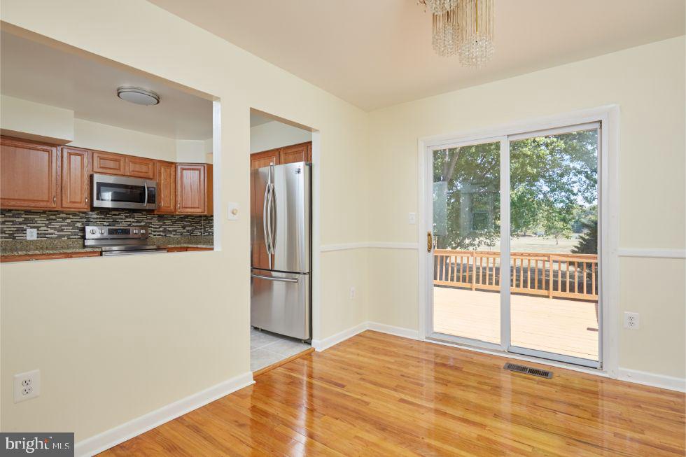 11504 Keystone Avenue Clinton, MD 20735 - Photo 9 of 33 Dining Room to Kitchen
