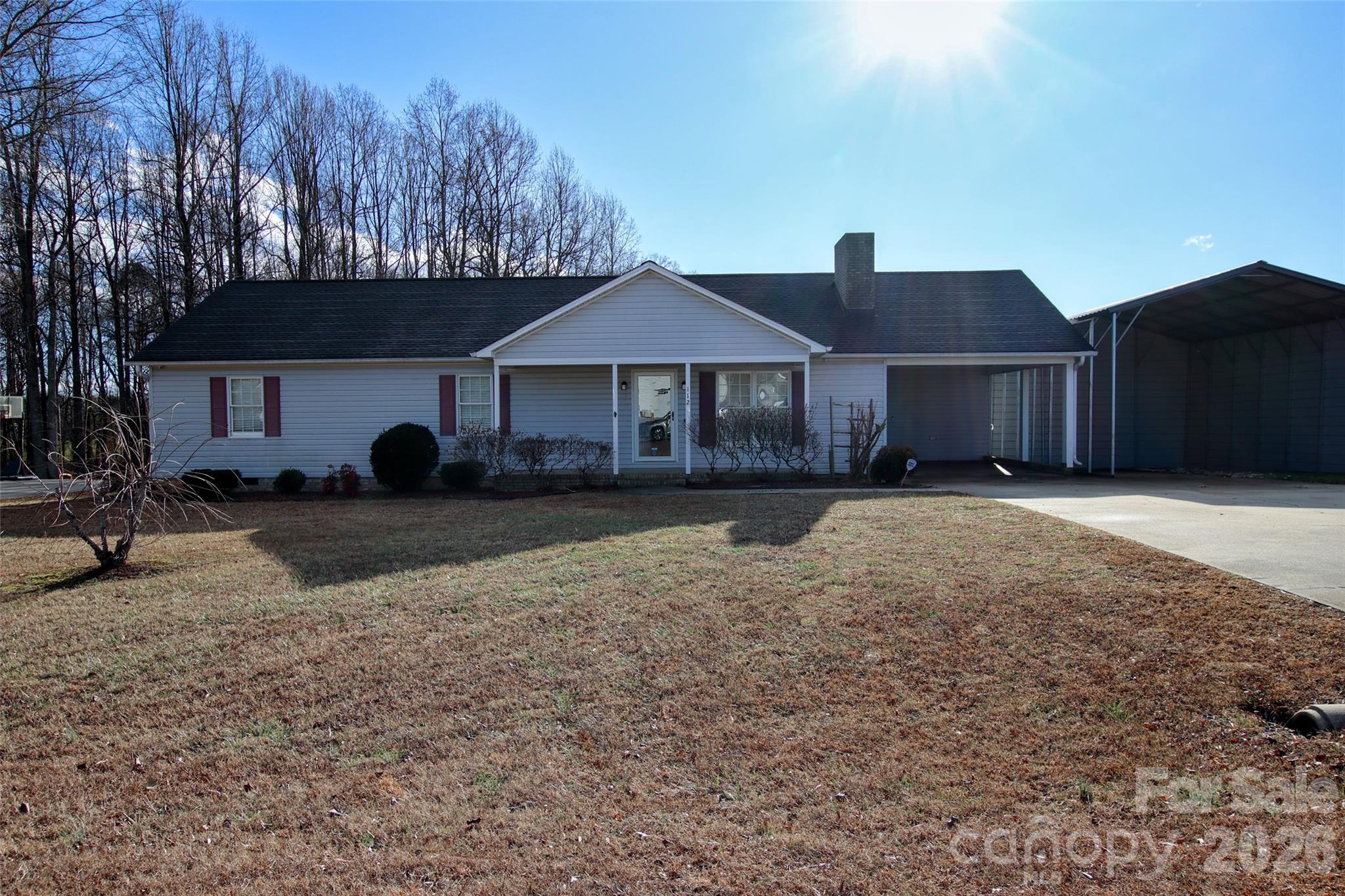 112 Wind Terrace Court Lexington, NC 27295 - Photo 1 of 4 a front view of a house with a yard