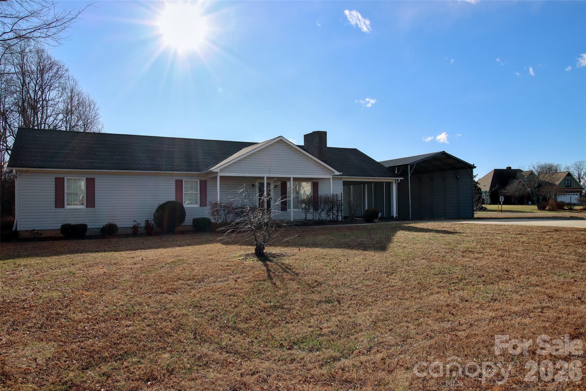 112 Wind Terrace Court Lexington, NC 27295 - Photo 2 of 4 a front view of a house with a yard