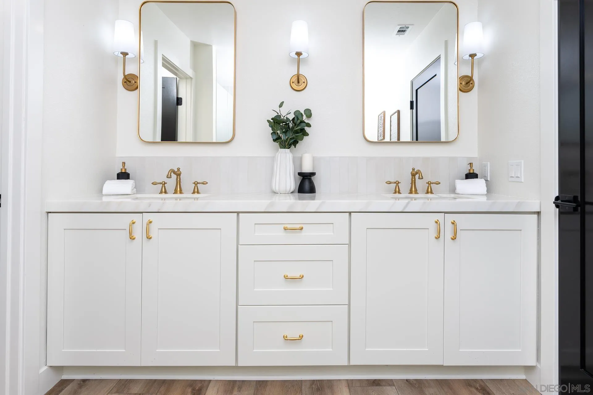 30603 Del Rey Road Temecula, CA 92591 - Photo 21 of 58 a bathroom with a sink and a mirror