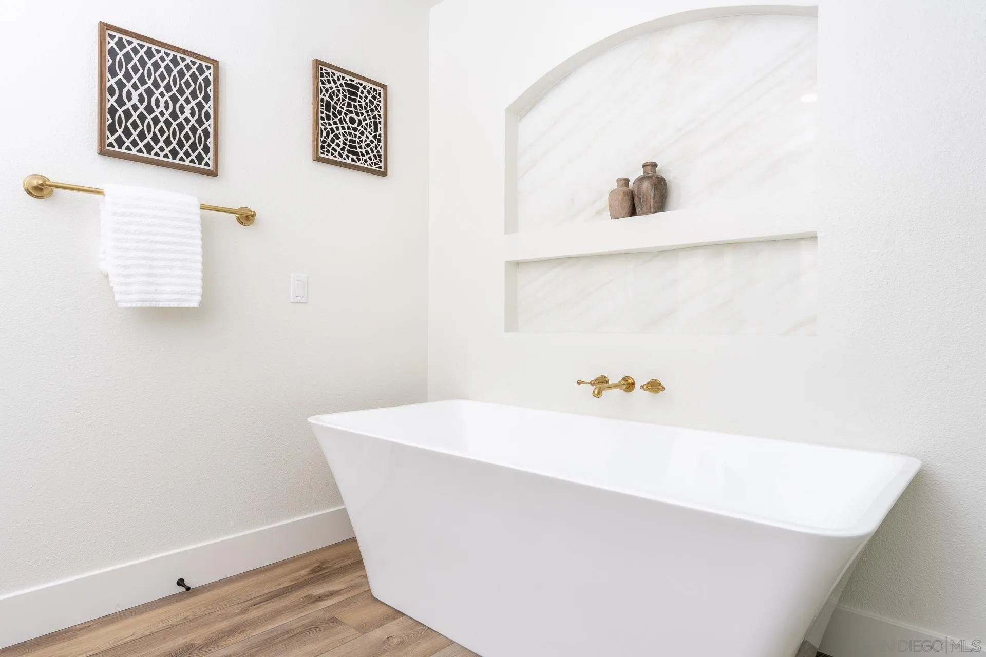 30603 Del Rey Road Temecula, CA 92591 - Photo 22 of 58 a white bath tub sitting next to a white cabinet