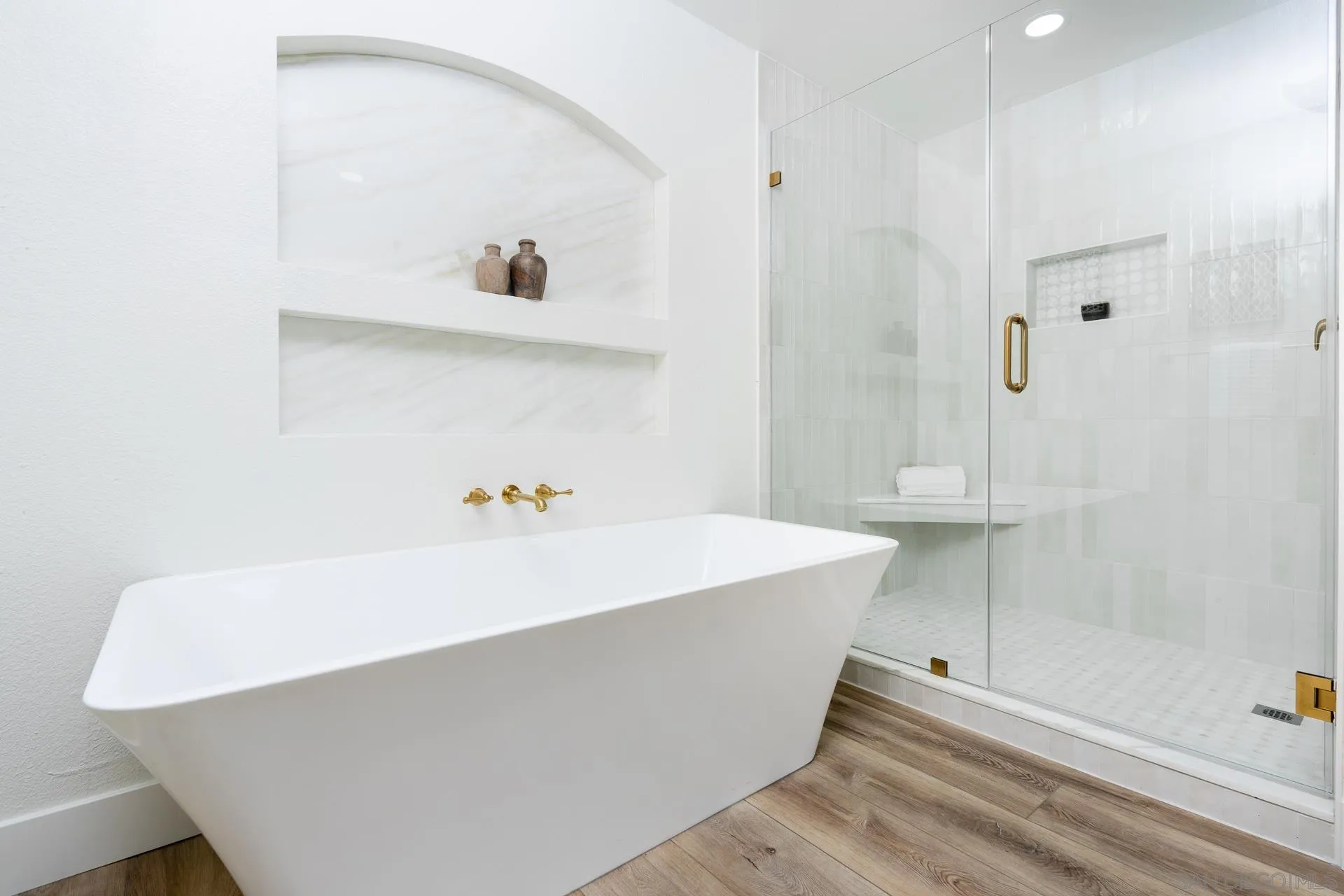30603 Del Rey Road Temecula, CA 92591 - Photo 23 of 58 a white bath tub sitting in a bathroom