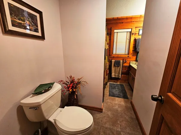 a view of a bathroom with a sink and a window