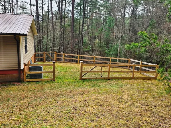 a view of swimming pool with a patio