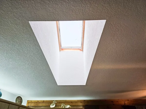 a view of a backyard of a house