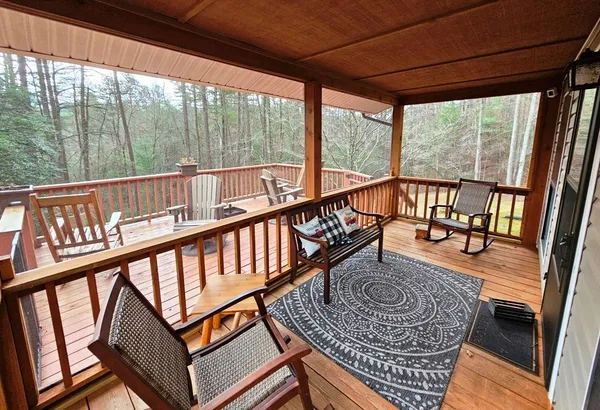 a view of an chairs and deck