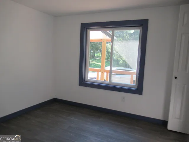 a view of a room that has a window