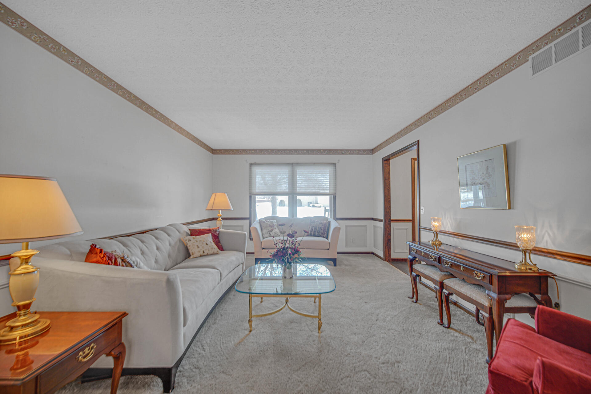 130 Wheatridge Road Valparaiso, IN 46385 - Photo 13 of 38 a living room with furniture and a window