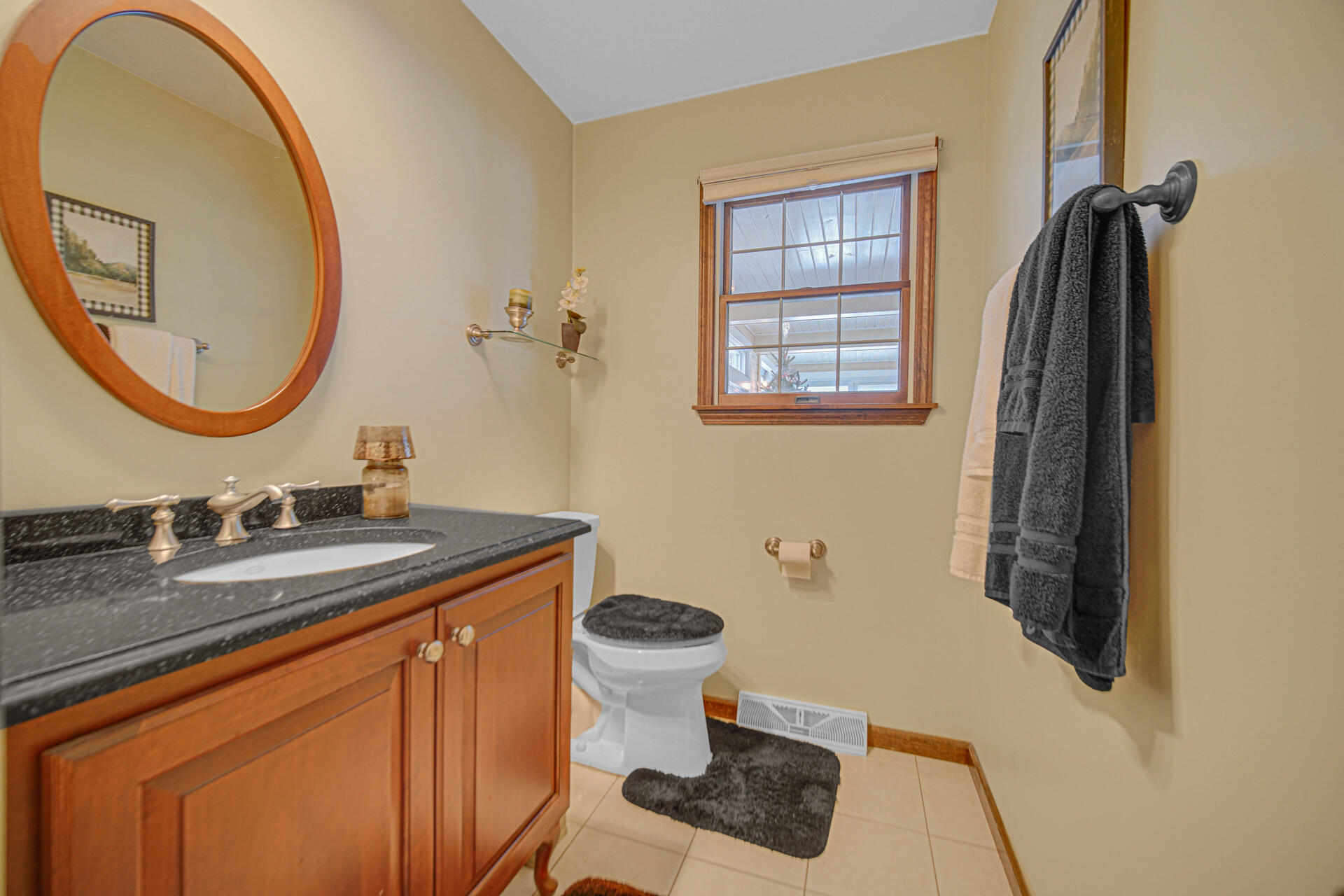 130 Wheatridge Road Valparaiso, IN 46385 - Photo 19 of 38 a bathroom with a sink and a mirror