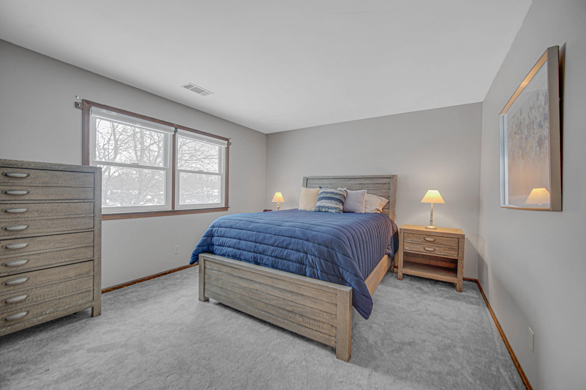 130 Wheatridge Road Valparaiso, IN 46385 - Photo 20 of 38 a bedroom with a bed and a window