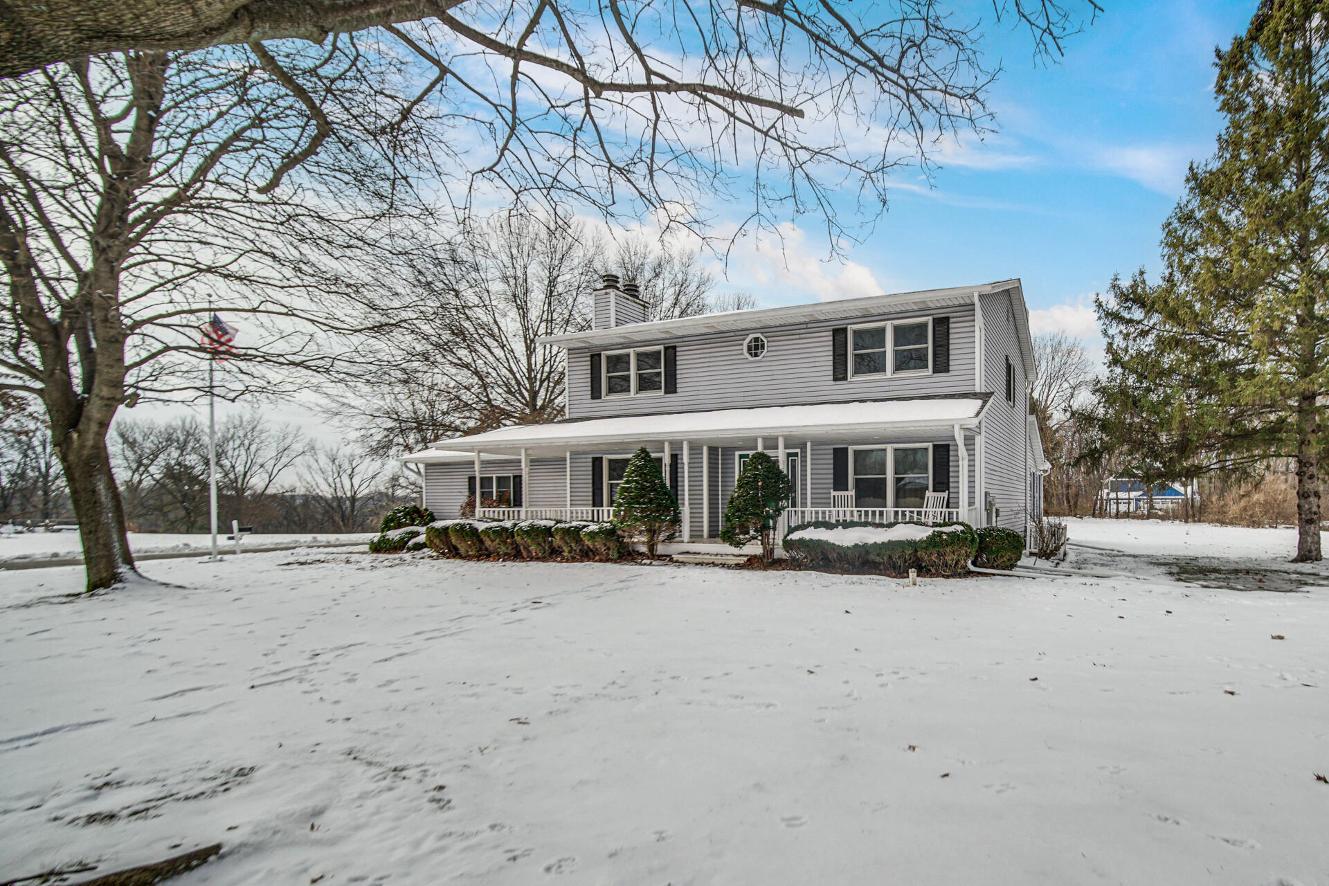 130 Wheatridge Road Valparaiso, IN 46385 - Photo 2 of 38 a view of a building with a snow