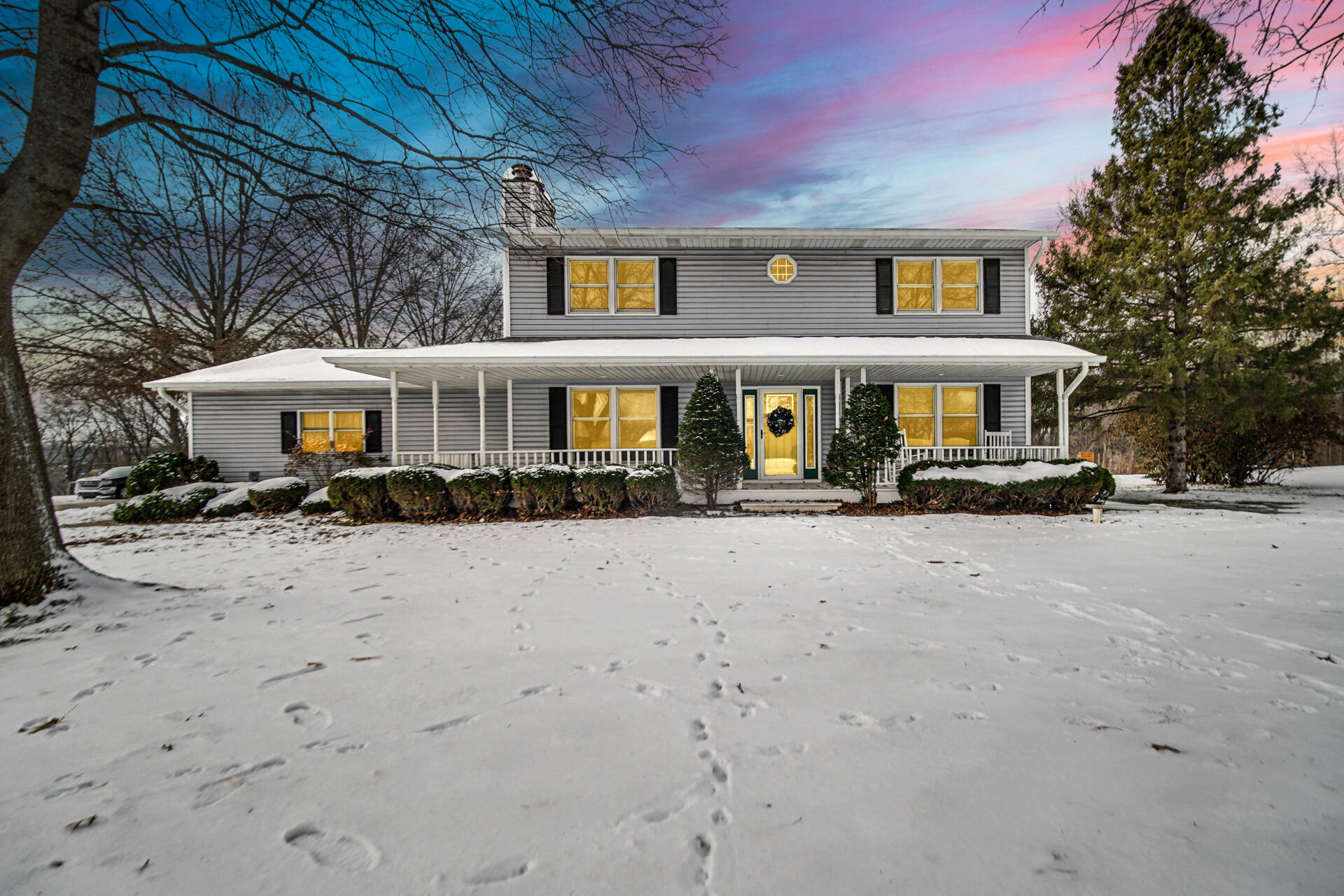 130 Wheatridge Road Valparaiso, IN 46385 - Photo 35 of 38 a front view of a house with a yard