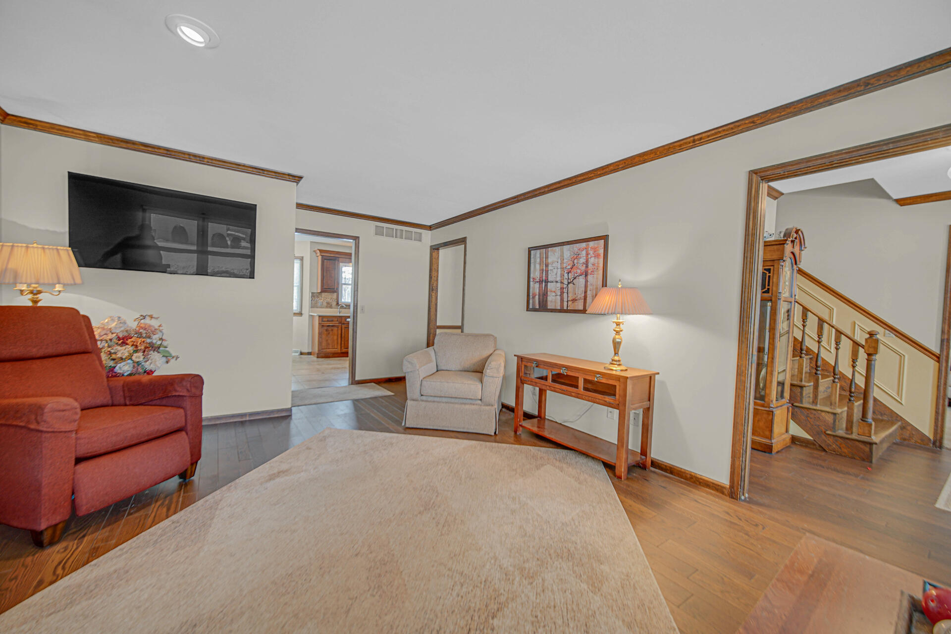 130 Wheatridge Road Valparaiso, IN 46385 - Photo 7 of 38 a living room with furniture and a flat screen tv