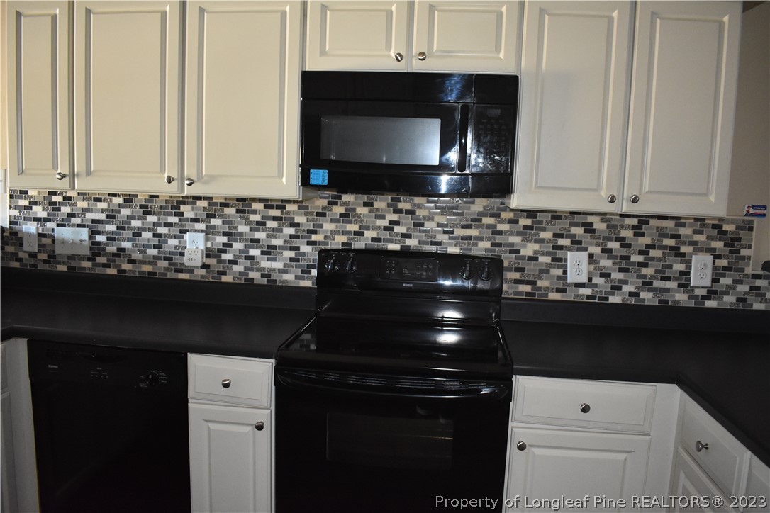 76 Ithica Lane Bunnlevel, NC 28323 - Photo 12 of 49 a bathroom with a sink a vanity and a mirror