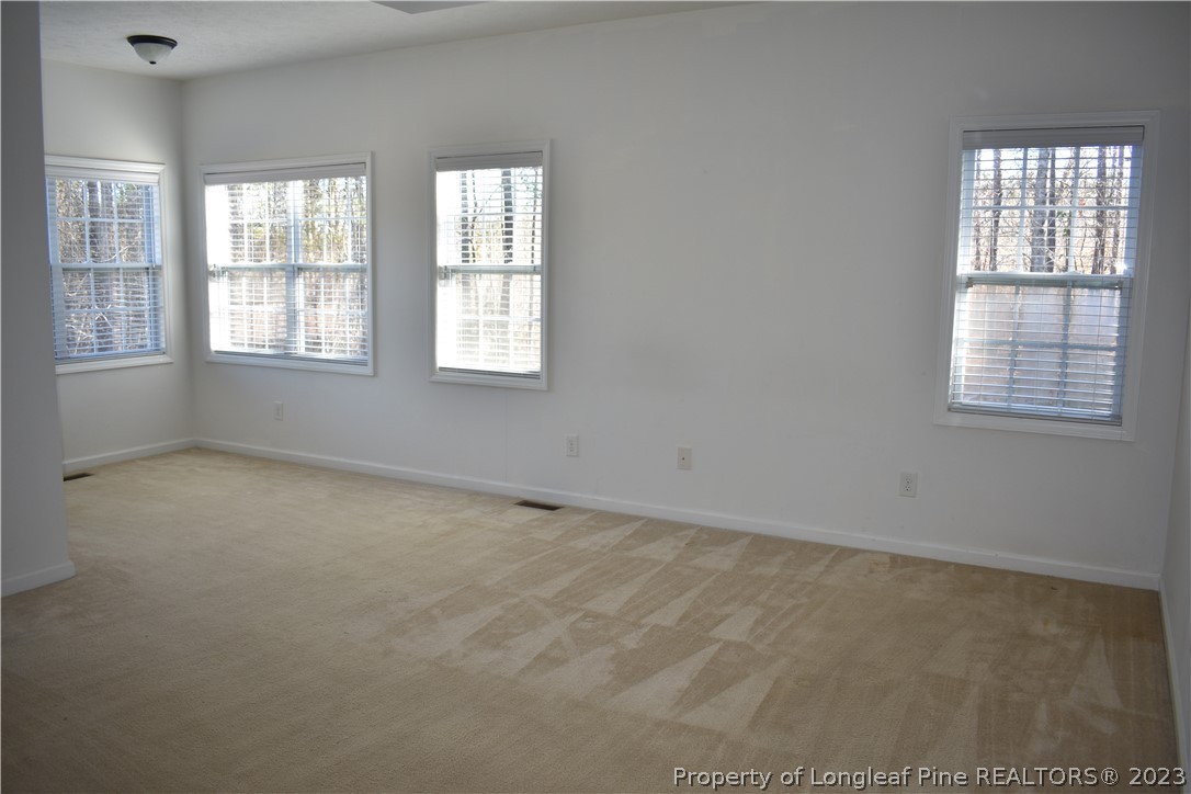 76 Ithica Lane Bunnlevel, NC 28323 - Photo 19 of 49 a view of an empty room with a window
