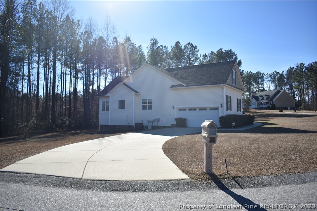 76 Ithica Lane Bunnlevel, NC 28323 - Photo 2 of 49 a house view with a outdoor space