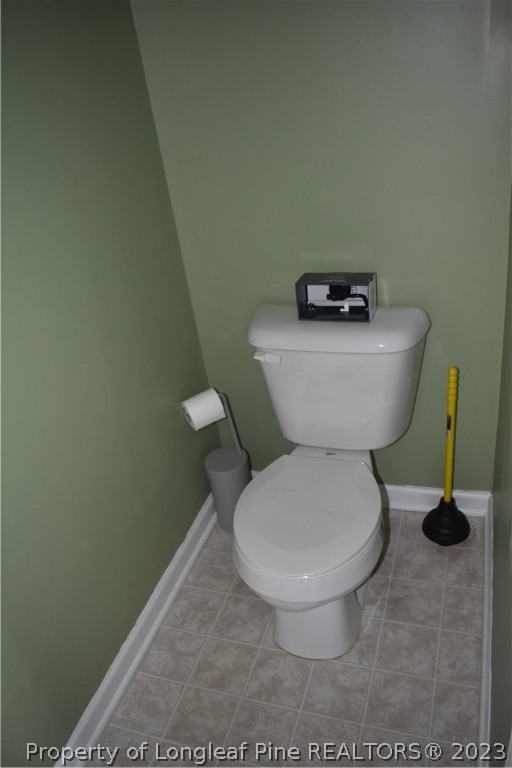 76 Ithica Lane Bunnlevel, NC 28323 - Photo 29 of 49 a small bathroom with a toilet and a sink