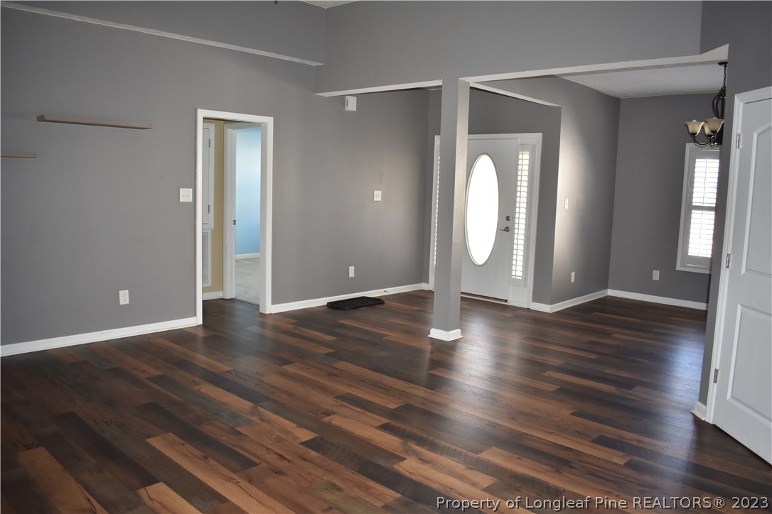 76 Ithica Lane Bunnlevel, NC 28323 - Photo 4 of 49 wooden floor in an empty room with a window