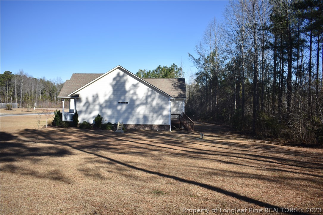 76 Ithica Lane Bunnlevel, NC 28323 - Photo 43 of 49 a view of a house with a yard