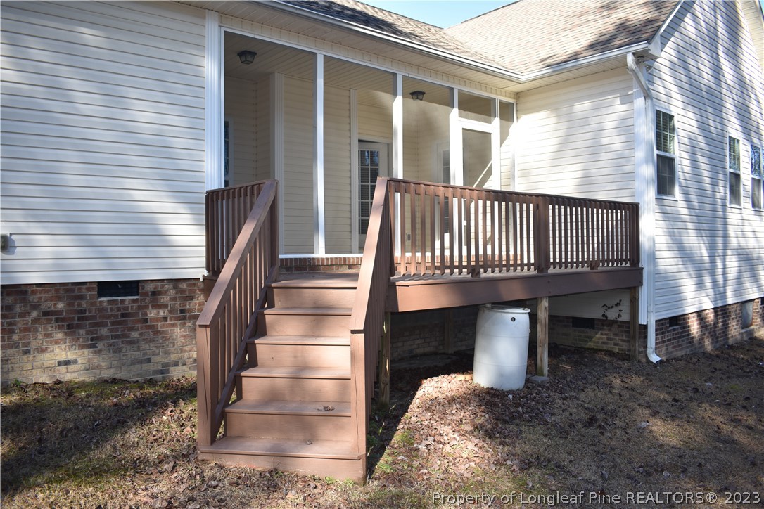 76 Ithica Lane Bunnlevel, NC 28323 - Photo 44 of 49 a view of a house with backyard and wooden fence
