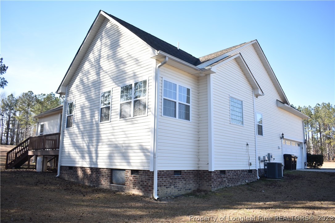 76 Ithica Lane Bunnlevel, NC 28323 - Photo 46 of 49 a view of a house with a yard