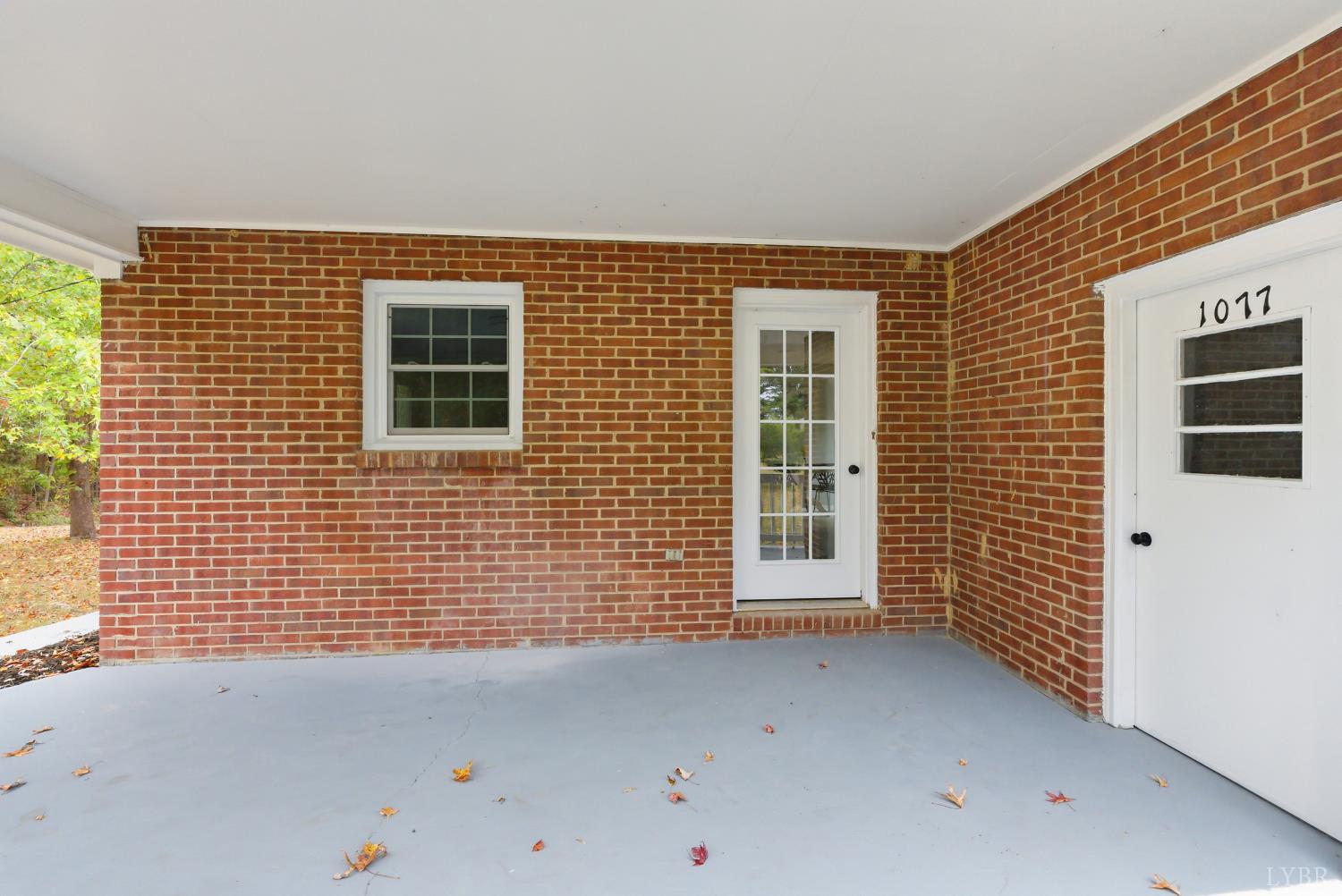 1077 Ringgold Road Ringgold, VA 24586 - Photo 16 of 35 a view of a house with an empty space