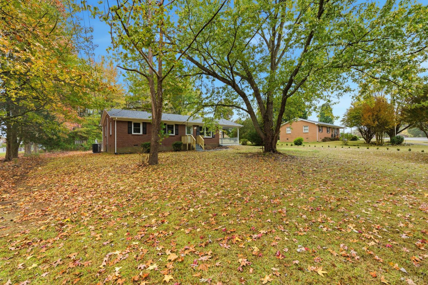 1077 Ringgold Road Ringgold, VA 24586 - Photo 33 of 35 a front view of a house with large garden